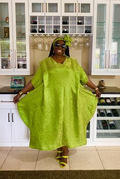 Our luxurious green kaftan boubou dress exudes sophisticated elegance with its beautiful, flowing drape. Designed for a loose fit, this dress is perfect for both casual relaxation and as stylish maternity wear. Its soft, breezy fabric makes it an effortlessly chic choice, combining comfort with glamour. Ideal for all body types, including plus-size, this oversized kaftan is not only versatile but also a thoughtful maternity gift. Our kaftan dresses can be customized with your measurements and personalization, please start a conversation with us, we usually respond within the hour or a little later. We are happy to answer any questions regarding measurements and styles before purchase. Note, that the customer is responsible for selecting the correct measurements.   *️⃣FEATURES  🔸Inner ties Green Short Sleeve Maxi Dress For Wedding, Elegant Green Midi Dress For Festive Occasions, Green Maxi Length Kaftan For Wedding, Elegant Green Kaftan For Evening, Elegant Green Midi Dress For Festive Season, Elegant Green Festive Maxi Dress, Elegant Green Festive Midi Dress, Festive Green Elegant Midi Dress, Elegant Green Kaftan For Festive Occasions