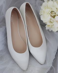 Elegant, chic with simplicity satin pointy toe ballet flats. Comfortable wear throughout your special day or to change into to dance the night away. Perfect for holiday party, night out and wedding party. DETAILS:COLORS AVAILABLE: Champagne, Ivory, Light Blue, Off White, Pink, Royal Blue, WhiteUPPER: Synthetic upper and liningMATERIALS: Mandmade outsole STYLE NAME: VANITA Classic Wedding Shoes, Quinceanera Shoes, Bridesmaids Shoes, Wedding Shoes Sandals, Flower Girl Shoes, Glitter Flats, Wedding Flats, Pointy Toe Flats, Lace Up Flats