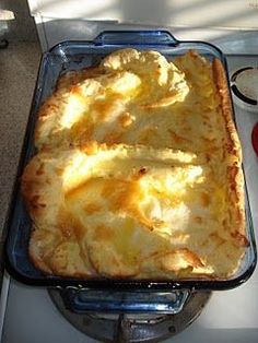 a casserole dish is sitting on top of the stove