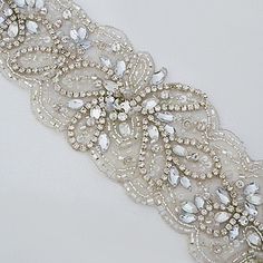 Fiore Couture Bridal Belts. Contemporary floral design with scallop edge, covered in beads and rhinestones. Incredible sparkle. Bridal accessories. Beaded White Bridal Belt For Party, White Beaded Bridal Belt For Party, Contemporary Floral Design, Bridal Belts, Beaded Necklace Tutorial, Hand Beaded Embroidery, Motifs Perler, Couture Bridal, Necklace Tutorial