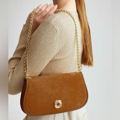 Faux Suede Flap Shoulder Bag With Gold Chain Strap * Color: Rust Brown * Medium Size * Faux Suede Pu Leather * Gold Chain Strap * Bag Height 5.9" Inch (15cm) * Bag Length: 11" Inch (28cm) * Bag Width: 2. Inch (5cm) * Strap Length: 26.4" Inch (67cm) Versatile Brown Shoulder Bag With Chain Strap, Chic Brown Shoulder Bag With Chain Strap, Chic Brown Shoulder Bag With Chain Detail, Brown Workwear Bag With Chain Strap, Chic Brown Shoulder Bag With Chain, Elegant Brown Shoulder Bag With Chain, Chic Brown Bag With Gold Chain, Chic Brown Shoulder Bag With Gold Chain, Everyday Leather Shoulder Bag With Gold Chain