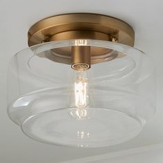 a close up of a light fixture on a ceiling