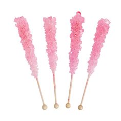 four pink cotton swabs on wooden sticks