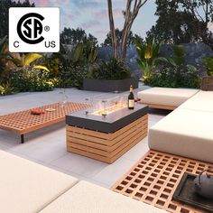 an outdoor living area with couches, tables and fire pit in the middle of it