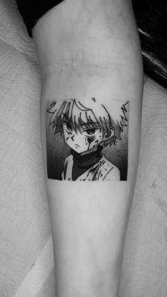 a black and white photo of an anime character on the leg