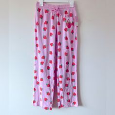 Strawberry Shortcake Pink Strawberry Graphic Pants Size: S, Xs Waist Size: S-28.5”; Xs-26.75” 60% Cotton, 40% Polyester Full Waistband Elastic 2 Side Pockets New With The Tag. Cute Summer Lounge Bottoms, Cute Spring Loungewear Pants, Cute Pants For Spring Loungewear, Cute Bottoms With Pockets, Cute Bottoms With Pockets Long Pants, Pink Bottoms With Elastic Waistband For Sleepover, Cute Summer Loungewear Pants, Full Length Pink Bottoms For Lounging, Cute Bottoms With Elastic Waistband For Loungewear