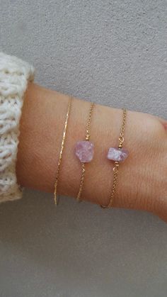 Before placing an order please check the estimated shipping times. If you need your order in a hurry shipping upgrades are available. Thank you. This dainty bracelet with the gentle essence of rose quartz is simply beautiful! It is also an alternative birthstone for those born in the months of January and October. D E T A I L S *It features a raw rose quartz crystal nugget. Each of these is unique and differs in size and shape. *It has been wire wrapped to a super dainty 14k stainless steel chai Everyday Jewelry With Natural Stones And Rose Quartz, Dainty Rose Quartz Healing Bracelet, Everyday Spiritual Rose Quartz Jewelry, Delicate Rose Quartz Bracelets With Natural Stones, Delicate Rose Quartz Bracelet With Natural Stones, Pink Quartz Jewelry For Healing, Everyday Rose Quartz Gemstone Jewelry, Dainty Rose Quartz Bracelets With Natural Stones, Dainty Rose Quartz Bracelet With Natural Stones