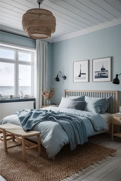 Industrial coastal bedroom with a blend of rugged metal accents, exposed brick, and beach-inspired decor for a modern seaside look. Coastal Industrial Decor, Beach Guest Bedroom, Boho Coastal Bedroom, Pintuck Bedding, Coastal Bedroom Aesthetic, Coastal Style Bedroom, Coastal Bedroom Ideas, Industrial Scandinavian, Coastal Calm