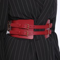 Made from smooth italian leather, the Maia Corset Belt is a timeless piece that will complete any outfit in style. With a generous front width, the belt tapers towards the back, creating a shape that flatter the waist.  Featuring 4 buckles at the front, this elegant piece can be easily paired with a dress or blazer. Handcrafted in EU using Italian Full Grain Leather and Nickel Plated Hardware        It is recommended to clean the products after each wear as follows:  The leather parts should be wiped with a soft cloth, slightly damp, and let dry at room temperature the metallic elements should be well wiped with a dry cloth  It is NOT recommended to expose the products to heat sources, humidity, water, solutions containing alcohol, fire      Avoid contact with rough or hot surfaces that ca Peplum Belt, 12 Dimensions, Leather Corset Belt, Leather Peplum, Water Solutions, Brand Magazine, Women Motivation, Corset Belt, Leather Corset