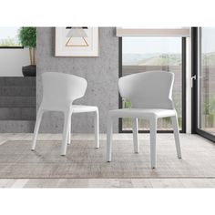 two white chairs sitting next to each other on top of a carpeted floor in front of a window