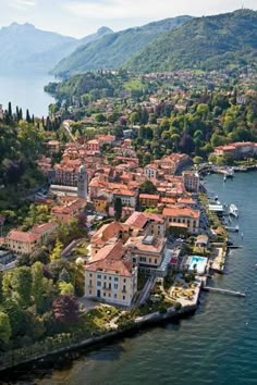 an aerial view of a town on the water