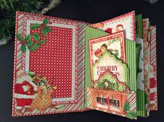 an open christmas card with red and green accents