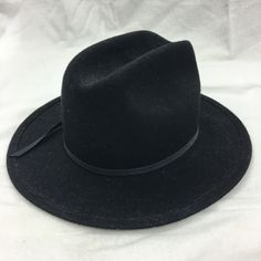 "Vintage Black Wool Felt Hat. Size Medium WPL 4384 USA John R. Craighead, Denver, CO. Hat. 21 1/2\" Inside Rim. 6\" Tall. This hat is in great shape. It is clean and ready to use. A second item may not be added to this one for free shipping. Size: Medium Dimensions:  11 1/2\" X 12 3/4\" across hat brim                         6\" to top of hat                         21 1/2\" inside hat edge For other hats, jewelry and vintage items see:  www.VeryVictorianStudio.etsy.com. For sewing related item Fitted Wide Brim Hat, Flat Bill Black Hat For Rodeo, Adjustable Black Top Hat With Wide Brim, Adjustable Black Top Hat For Winter, Solid Brimmed Rodeo Hats, Fall Costume Hats With Curved Brim, Black Winter Rodeo Hat, Black Costume Hat With Short Brim, Adjustable Black Flat Brim Fedora