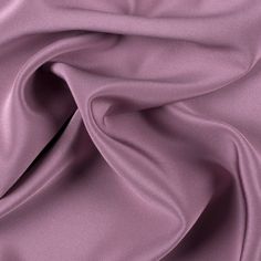 a close up view of a purple fabric