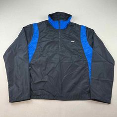 Vintage 90s Nike Swoosh Windbreaker Jacket Adult Large Black Blue Gray Tag

Size L. Fair Condition, left pocket zipper does not work. Undone left cuff seam stitching. Imprints on left sleeve.

Pit to pit: 23"
Length: 26"
Shoulders: 18”

**********************************
Measurements are taken laid flat; please double check for fit. For best accuracy, compare measurements to a similar garment that fits you well.

*Please note that this item is pre-owned and subject to defects. We do our best to Vintage Black Windbreaker For Outdoor Activities, Retro Black Windbreaker For Outdoor Activities, Nike Blue Track Jacket For Streetwear, 90s Style Black Outdoor Outerwear, 90s Style Black Outerwear For Outdoor, 90s Black Windbreaker With Pockets, 90s Style Black Windbreaker With Pockets, Black 90s Style Windbreaker With Pockets, 90s Black Windbreaker For Outdoor Activities