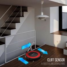 an image of a room with stairs and a robotic vacuum cleaner on the floor in front of it