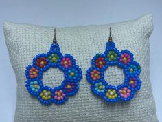 Handcrafted production. Earrings made of natural product beads with Turkish and Central Asian motifs. Traditional Handmade Multicolor Chandelier Earrings, Flower-shaped Colorful Beaded Earrings, Multicolor Flower-shaped Dangling Beaded Earrings, Bohemian Flower-shaped Earrings With Colorful Beads, Multicolor Flower-shaped Earrings With Colorful Beads, Colorful Earrings, Handmade Beads, Diy Earrings, Beaded Earrings