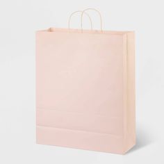 a pink shopping bag on a white background