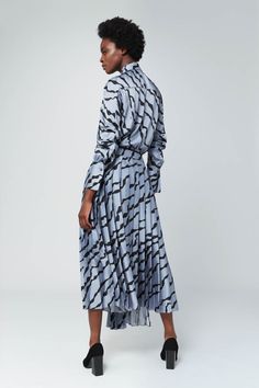 A fluid steel blue shirt with a relaxed fit and oversized cuffs, neat collar and gathered shoulder detail. It features an abstract stripe print in black and can be worn with the matching skirt or with our classic denim jeans. Shoulder Shirts, Fall Winter Outfits, Blue Shirt, Cut And Style, Stripe Print