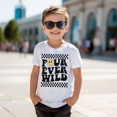 Get ready to celebrate in style with our 'Four Ever Wild' collection! If you're on the hunt for a skater retro checkered 4th birthday outfit for your little man, look no further. Let him hit the birthday scene in our skateboard skater-inspired 'Four Ever Wild' tee, ensuring he rocks his 4th birthday in style! ✨ CHECK OUT MORE BIRTHDAY ITEMS ✨https://www.etsy.com/shop/babysquishycheeks/?etsrc=sdt§ion_id=21016170 👕 SILHOUETTES OPTIONS👕✧BLACK SLEEVE RAGLAN TEE (pictured): This light-weight 3/4 sleeve, features a white body, with black sleeves. This runs in a standard fit.✧T-SHIRT: High-quality cotton fabric standard tee. These run lean, so size up for a looser fit. Available in Black or White✧BODYSUIT: High-quality cotton fabric, with the envelope neckline to easy on and off. He is sure to Four Ever Wild Birthday Boy, 4 Ever Young Party Theme Boy, Four Year Old Boy Birthday Themes, Boys 4th Birthday Party Ideas, 4th Birthday Shirts For Boys, 4 Year Birthday Party Ideas Boy, 4th Birthday Shirts, 4th Birthday Shirt Boys, Four Year Old Shirt