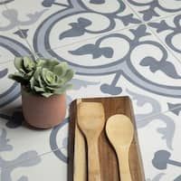 two wooden spoons on a tray next to a succulent plant