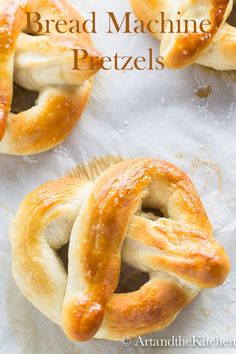 homemade bread machine pretzels on parchment paper with text overlay that reads, bread machine pretzels