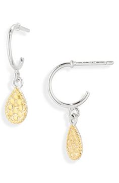 Bubbled texture decorates the teardrop charms dangling from elegant huggie hoop earrings handcrafted in Bali with gleaming 18-karat gold plate. 18k-gold plate Imported Anna Beck, Huggie Hoop Earrings, Beck, Silver Gold, Bali, 18k Gold, Gold Plate, Hoop Earrings, Bubbles