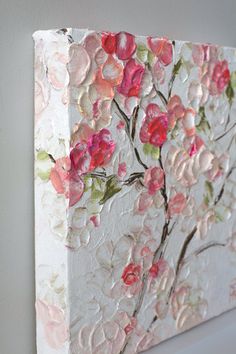 a painting with flowers painted on it