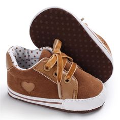 Baby Girls Lace Up Canvas Star Sneakers Wholesale - PrettyKid Brown Non-slip High-top Sneakers, Casual Brown Sneakers For Playtime, Casual Brown Sneakers With Soft Sole, Brown Casual Sneakers With Soft Sole, Brown Lace-up Sneakers With Soft Sole, Brown Sneakers With Soft Sole For Playtime, Non-slip Lace-up Sneakers For Playtime, Cute Non-slip Closed Toe Sneakers, Casual Lace-up Booties For Playtime