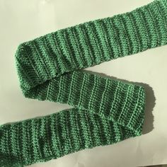 This hand-crocheted scarf is so soft and perfect for Winter! Made with love in Canada. Cozy Crochet Yarn Infinity Scarf, Green Acrylic Yarn Scarf For Winter, Green Acrylic Yarn Scarves For Winter, Green Yarn Scarves For Winter, Winter Green Yarn Scarves, Casual Hand Knitted Yarn Scarves, Casual Knitted Scarves, Casual Knitted Infinity Scarf, Casual Hand Knitted Infinity Scarf