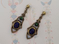 "Only $4 SHIPPING and additional items ship FREE (except doll furniture). Vintage Blue GLASS SCARAB Dangling Earrings made with vintage scarabs and setting.  NOS New Old Stock - vintage but unused jewelry parts. Condition:  Handmade using NOS vintage materials -- \"New Old Stock\".  Not reproductions. NOS materials are old inventory from costume jewelry companies in the 50's that have gone out of business.  These were never sold at retail so they are \"new\" (meaning unused) but \"old\" because of their age.   Size: see last picture" Vintage Blue Brass Earrings, Vintage Cabochon Dangle Earrings, Vintage Oval Metal Earrings, Vintage Cabochon Metal Earrings, Vintage Metal Cabochon Earrings, Egyptian Aesthetic, Egyptian Revival Jewelry, Cameo Pendant Necklace, Cameo Earrings