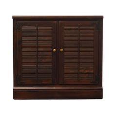 a wooden cabinet with two doors and shutters on the front, against a white background