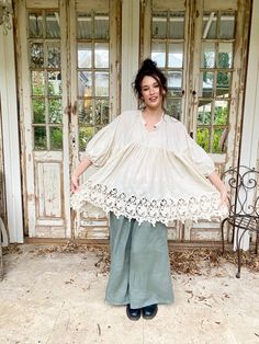 This is simply exquisite. Made from vintage French cotton lace, a very wide band of cutwork lace, makes this a glorious dress or top to wear.  In one very generous size, it looks equally beautiful on a petite woman or full figure. This stunning smock is the best to wear in any season . Easy to care for....100%cotton .. wash and hang dry . Elegant Lace Top With Crochet Trim, Elegant Lace Blouse With Crochet Trim, Feminine Cotton Lace Top, Elegant Cotton Lace Top With Lace Trim, Lace Top With Crochet Trim For Daywear, Bohemian Cotton Lace Blouse With Lace Trim, Elegant Cream Crochet Top With Lace Trim, Cream Lace Blouse With Crochet Trim, Elegant Beige Crochet Top With Lace Trim