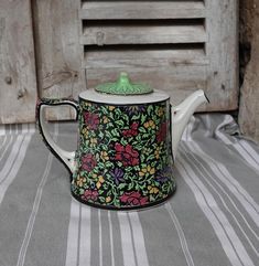 a tea pot sitting on top of a table