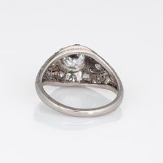 This is part of Chairish’s Fine Jewelry assortment.  Finely detailed antique Edwardian diamond engagement ring (circa 1900s to 1910s) crafted in 900 platinum.   Centre set old European cut diamond is estimated at 0.55 carats (estimated at H-I colour and VS2-SI1 clarity). 8 single cut diamonds total an estimated 0.08 carats. The total diamond weight is estimated at 0.63 carats.   The old European cut diamond is set securely set into a four pronged mount upon a finely detailed platinum mount. Scro Wedding Ring Guard, Platinum Wedding Band, Engagement Ring Vintage, Diamond Engagement Rings Vintage, Right Hand Rings, Antique Engagement, Antique Engagement Rings, European Cut Diamonds, Ring Vintage