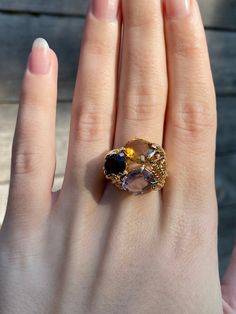 Total Weight: 8.4 grams Size: 7 Width: 2-20mm Citrine & Amethyst: 10x8mm Garnet: 9x7mm Condition: In good condition with no damage. Stones show some wear so priced low.  All gold has been thoroughly checked with an Olympus XRF spectrometer. It is guaranteed 14k gold.  All our jewelry is properly washed and disinfected to ensure customers get clean items with every order.  Returns accepted but may be subjected to a restock fee.  Please message with any questions:) Luxury Multicolor Amethyst Ring For Gift, Luxury Multicolor Amethyst Ring As Gift, Luxury Multicolor Amethyst Ring Gift, Luxury Multicolor Amethyst Ring For Anniversary, Exquisite Yellow Gold Amethyst Ring With Accent Stones, Elegant Multicolor Amethyst Gemstone Ring, Gold Multi-stone Citrine Gemstones, Multi-stone Amethyst Ring In Yellow Gold, Yellow Gold Citrine Gemstones With Multi-stone Detail