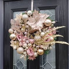 a wreath is hanging on the front door