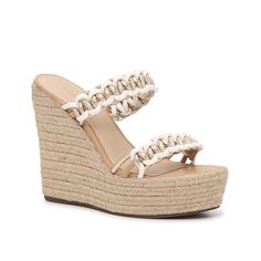 Schutz-Juliet Sandal Elevate your casual looks or finish off formal 'fits with the Juliet sandal from Schutz. Featuring the silhouette of a classic wedge, this pair features an elegant double strap design that is crafted with interlocking goldtone details. Perfect for styling with paperbag shorts or a sweet sundresses. Leather Wedge Sandals With Braided Straps For Summer, Synthetic Double Strap Wedge Sandals, Summer Wedge Sandals With Braided Straps, Chic Wedge Sandals With Braided Straps, Summer Double Strap Synthetic Heels, Summer Synthetic Double Strap Heels, Synthetic Double Strap Summer Heels, Chic Spring Wedge Sandals With Braided Straps, Summer Sandals With Braided Straps And Wedge Heel