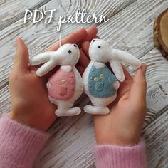 two small stuffed animals are held in their hands with the words pdf pattern above them