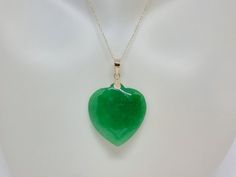 Heart GREEN Jade 14k Solid Yellow Gold Pendant / Necklace 18 Inches Gold Rope Chain. JADE LOVER Heart Pendant. Product Info: - Heart Stone: Green Jade. - Heart Measures: 25mm x 25mm Green Jade. - Pendant Measures: 35x25mm - Metal: 14k Solid Gold. - Chain Length: 18 Inches Rope Chain. - Nice Gift Box Included. Heart-shaped Green Emerald Necklace As Gift, Heart-shaped Green Emerald Necklace For Gift, Green Heart-shaped Emerald Necklace For Gift, Green Heart Pendant Emerald Necklace As Gift, Green Emerald Heart Pendant Necklace As Gift, Green Emerald Heart Pendant Necklace For Gift, Green Emerald Heart Pendant Necklace, Green Heart-shaped Emerald Necklace, Green Emerald Heart-shaped Necklace