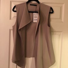 Zara Women Beautifully Crafted Vest Elegant Sleeveless Blouse For Fall, Chic Taupe Outerwear For Spring, Elegant Beige Vest For Layering, Chic Beige Office Vest, Elegant Beige Vest For Spring, Elegant Open Front Tops For Workwear, Spring Workwear Blouse In Neutral Color, Fall Workwear Sleeveless Blouse, Spring Workwear Neutral Blouse