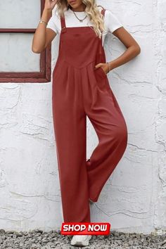 This solid overall straight leg jumpsuit embodies versatile style. Its button-up design offers a fashionable twist. Perfect for various occasions, this jumpsuit blends comfort and trendiness effortlessly, making it an ideal choice for a chic and adaptable wardrobe. Casual Non-stretch Jumpsuits And Rompers In Solid Color, Casual Non-stretch Solid Jumpsuits And Rompers, Solid Color Overalls For The Beach, Beach Jumpsuit With Button Closure, Beach Jumpsuit Or Romper With Button Closure, Casual Solid Color Jumpsuit With Bib Front, Casual Solid Bib Front Jumpsuits And Rompers, Casual Solid Bib Front Jumpsuit/romper, Casual Solid Jumpsuits And Rompers With Buttons