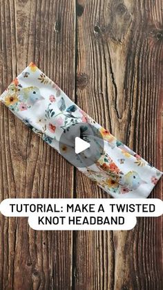 the video is showing how to make a twisted knot headband with flowers on it