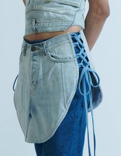 Bootcut denim with a trompe-l'oeil look, made from upcycled denim. Comes with a de-attachable piece.About the label-Matcha Pret is a ready-to-wear label for the hims, hers, and thems.Promoting upcycling, and creating a difference is our aim. We believe clothes can get a second life beyond gender, our other aim is slow fashion and providing outfits that aren't mass-produced or harmful to the environment. We want to create a difference in the way independent businesses operate, we want Matchapret Things To Make With Denim, Denim Upcycle Clothing, 2024 Denim, Shoe Refashion, Denim Scraps, University Outfit, Denim Ideas, Recycle Jeans, Fashion Organization