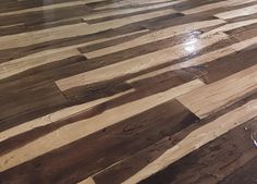 a wooden floor that has been stripped and stained