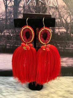 handcrafted by artisans from the most representative areas Artisan Drop Earrings For Party, Handmade Red Tassel Earrings For Festive Occasions, Handmade Red Tassel Earrings, Elegant Style, Handmade Artisan Earrings For Celebration, Artisan Handmade Earrings For Celebration, Handmade Elegant Red Tassel Earrings, Artisan Dangle Earrings For Party, Elegant Handmade Tassel Drop Earrings, Elegant Red Handmade Tassel Earrings