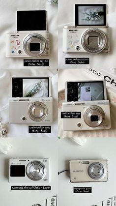 several different cameras sitting on top of a white sheet with the words canon written below them