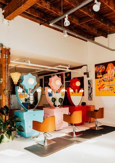 a room filled with lots of different colored furniture