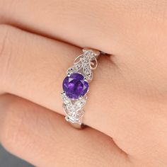 Amethyst Ring Antique Engagement Ring February Birthstone White Gold Twig Art Deco Milgrain Leaf Filigree Flower Vine Anniversary Promise ITEM INFORMATION: Metal Type: Solid 14K White Gold Band Width: 1.7mm Size: US4-9 Center Stone: 5.5mm Natural Amethyst Side Stone: Natural Diamond Weight: 0.09CT Cut: Round cut Clarity: SI-VS Color: G-H √ CUSTOM √ LAYAWAY √ ENGRAVING √ GIFT WRAPPING For matching this ring, you can have: * https://www.etsy.com/listing/609566461 * https://www.etsy.com/listing/595 Feb Birthstone, Amethyst Jewelry Necklace, Purple Engagement Rings, Antique Amethyst Ring, Leaf Filigree, Birthstone Engagement Rings, Moissanite Engagement Ring White Gold, Rings Opal, Twig Art