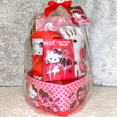 the hello kitty gift set is wrapped in plastic